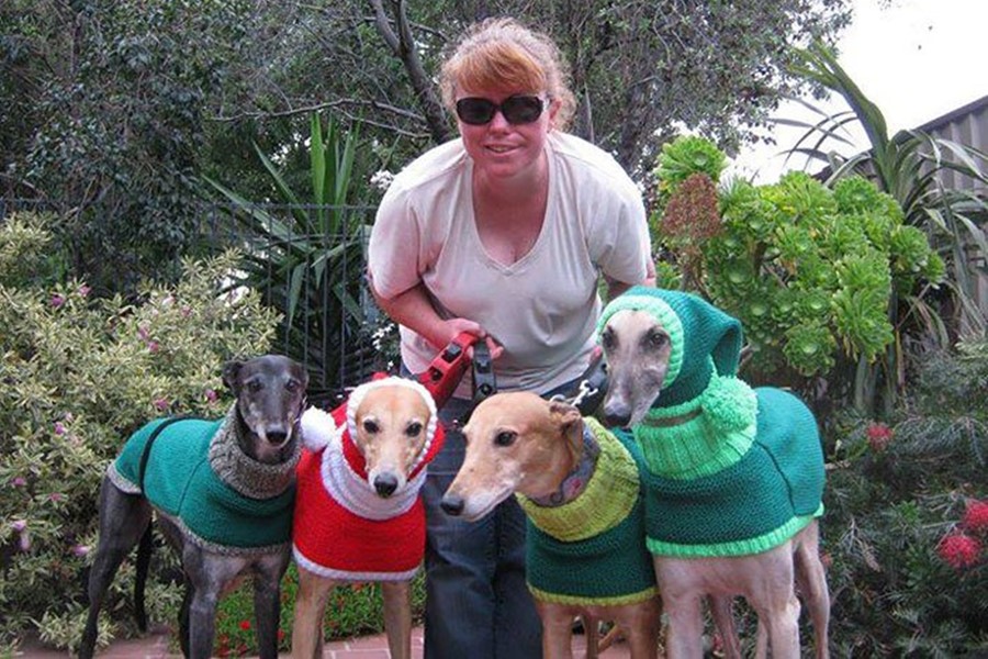 woman knits dog sweaters