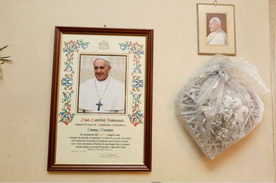 A parchment received from the Pope hangs on a wall in Emma Morano’s home – Source: Antonio Calanni